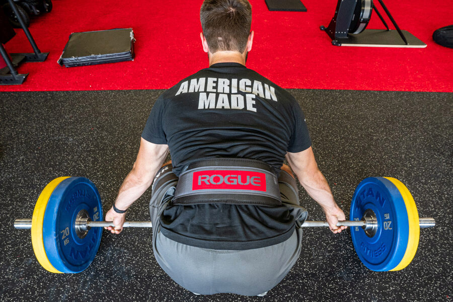 Deadlifting with a belt.