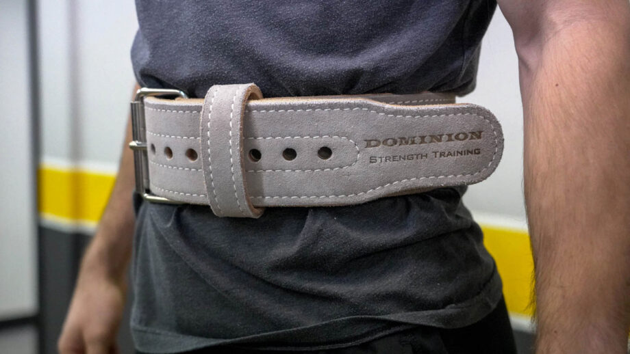 Wearing a Dominion Strength weight belt.