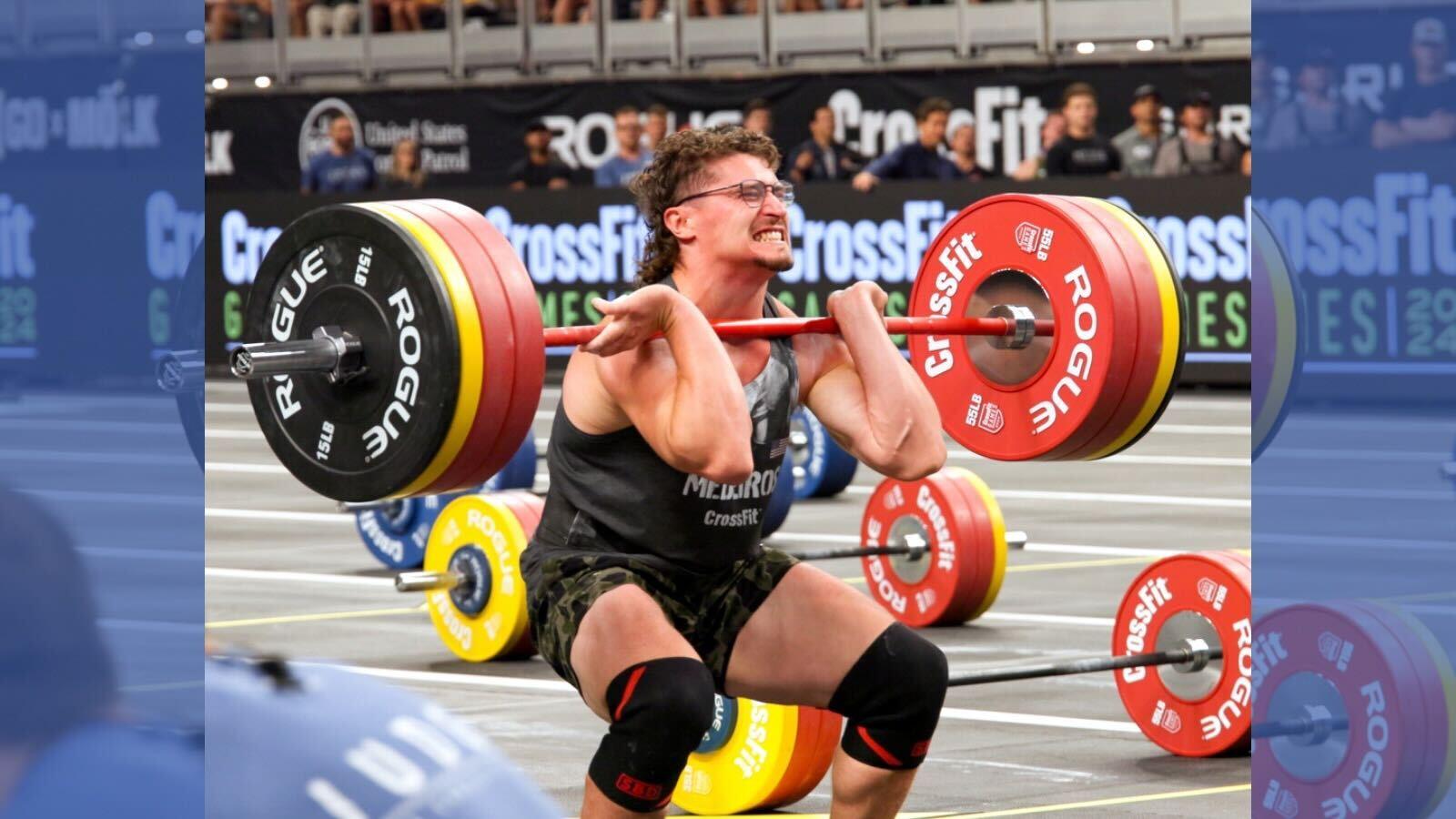Justin Medeiros performing a clean at the 2024 CrossFit Games.