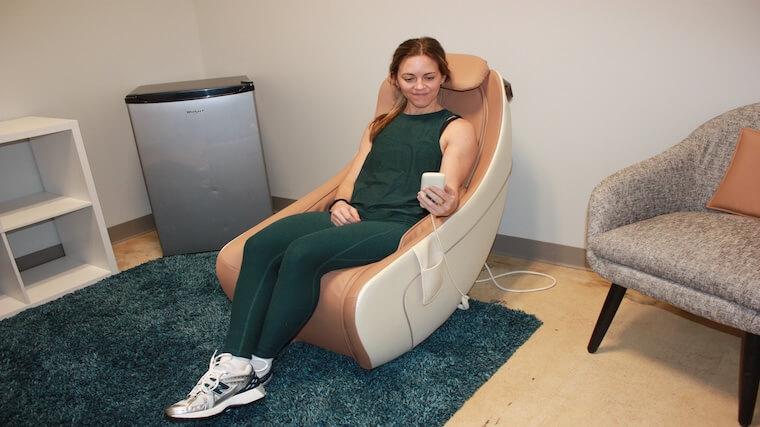Our tester sitting in the Synca Wellness CirC Massage Chair